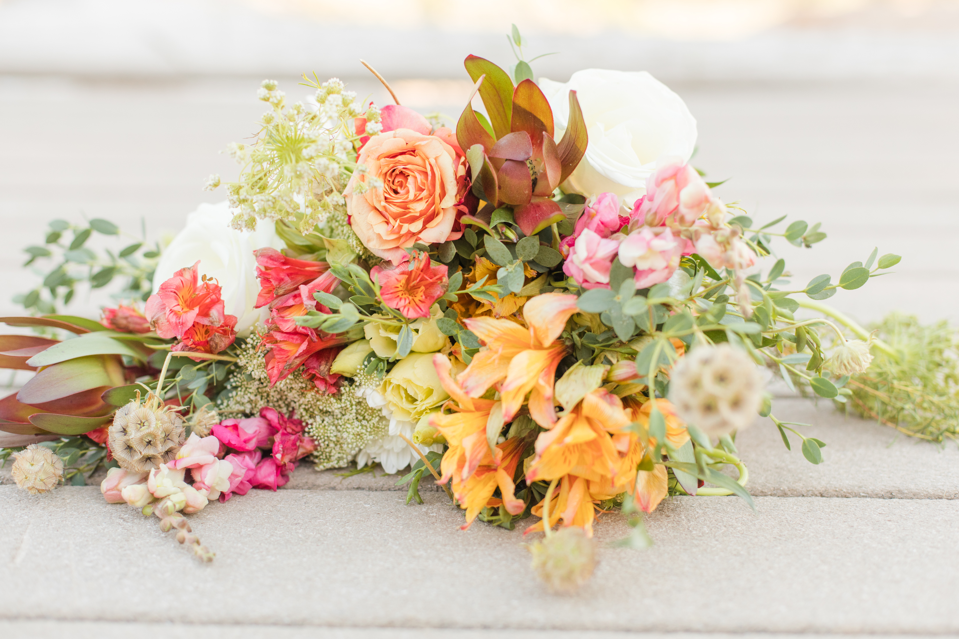 A colorful boho bouquet of roses and alstroemeria